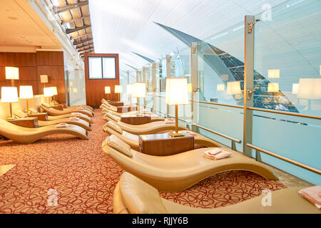 DUBAI, UAE - CIRCA APRIL, 2016: interior of Emirates business class lounge. Emirates is the largest airline in the Middle East. It is an airline based Stock Photo