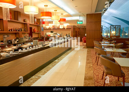 DUBAI, UAE - CIRCA APRIL, 2016: interior of Emirates business class lounge. Emirates is the largest airline in the Middle East. It is an airline based Stock Photo