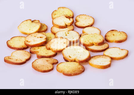Toasted bread  (Italian bruschetta toasts) isolated on white background, Top view. Slices of toasted baguette Stock Photo