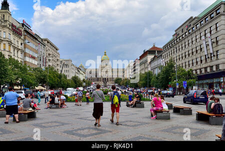 View up the Wenceslas Square half mile long 14th century park with Narodni national museum at end during summer, Prague Stock Photo