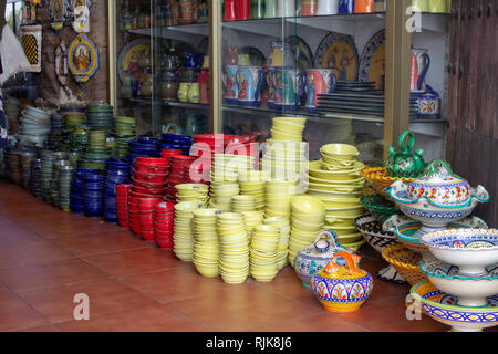 Mijas, Spain. A selection of brightly coloured pottery on sale in a shop in Mijas, Spain. Stock Photo