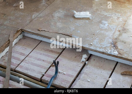 Remove polystyrene wood panels from the floor Stock Photo