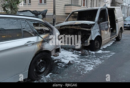 Berlin, Germany. 07th Feb, 2019. A burnt-out van, which was in use for the online retailer Amazon, stands on Sarrazinstraße. During the night, unknown perpetrators had set the vehicle on fire. The flames also spread to a car parked in front of the van. Two bicycles were also destroyed. Credit: Paul Zinken/dpa/Alamy Live News Stock Photo