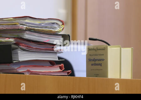 Augsburg, Germany. 07th Feb, 2019. The trial files are stored on the judges' table next to the codes of law in the Criminal Justice Centre. Two persons in charge of a children's cancer aid association are accused of fraud and infidelity. They are said to have kept more than 150000 Euro in donations for themselves. Credit: Karl-Josef Hildenbrand/dpa/Alamy Live News Stock Photo