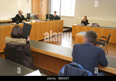 Augsburg, Germany. 07th Feb, 2019. A 39-year-old man is sitting next to a 50-year-old woman in the dock at the Criminal Justice Centre. The two responsible persons of a children's cancer aid association are accused of fraud and infidelity. They are said to have kept more than 150000 Euro in donations for themselves. Credit: Karl-Josef Hildenbrand/dpa - ATTENTION: Person(s) was/are pixelated for legal reasons./dpa/Alamy Live News Stock Photo