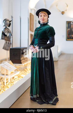 07 February 2019, Saxony, Königstein: A model presents a Renaissance dress at the annual press conference of the fortress Königstein in the exhibition rooms of the Georgenburg, which will be used at the planned Renaissance festival on the occasion of the 400th anniversary of the Georgenburg. Photo: Monika Skolimowska/dpa-Zentralbild/ZB Stock Photo