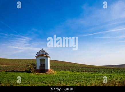 Small rectangular chapel under the village of Strazovice in South Moravia on a sunny autumn day Stock Photo