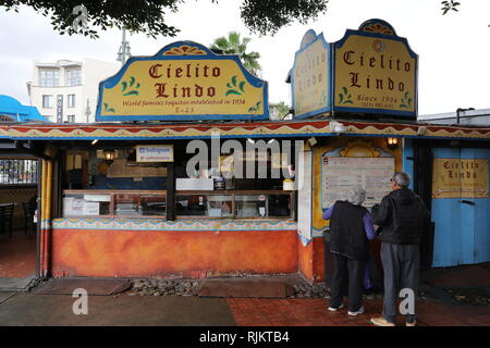 Olvera Street (Calle Olvera or Placita Olvera) is a historic district in downtown Los Angeles. Stock Photo