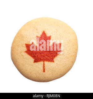 Macaron decorated with red maple leaf made for Canada Day Stock Photo