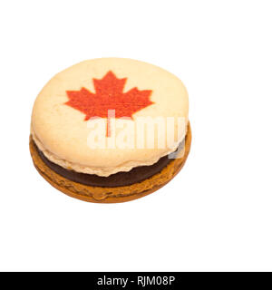 Macaron decorated with red maple leaf made for Canada Day Stock Photo