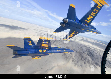 EL CENTRO, Calif. (Feb. 4, 2019) The U.S. Navy Flight Demonstration Squadron, the Blue Angels, diamond pilots perform the diamond 360 maneuver over the Imperial Valley during a training flight. The Blue Angels are conducting winter training at Naval Air Facility El Centro, California, in preparation for the 2019 show season. The team is scheduled to conduct 61 flight demonstrations at 32 locations across the country to showcase the pride and professionalism of the U.S. Navy and Marine Corps to the American public. U.S. Navy photo by Mass Communication Specialist 1st Class Ian Cotter (Released) Stock Photo