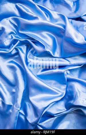 Close up of baby blue satin fabric Stock Photo