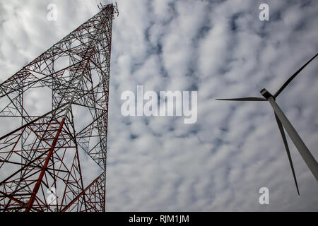 Close up Wind turbine with high power tower. Eco power. Stock Photo