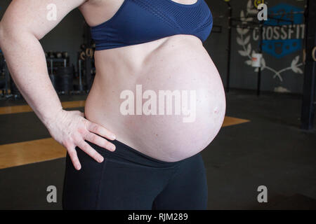 Avocado pregnant belly Stock Photo