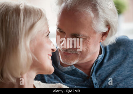 Close up portrait aged couple in love Stock Photo