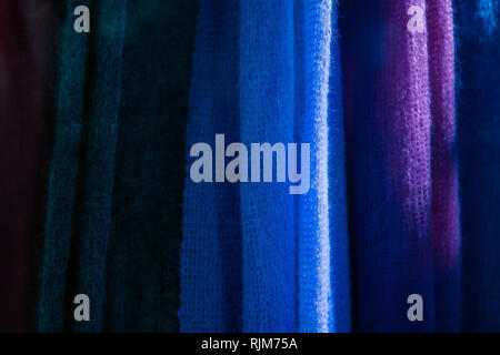 Close up of knitting texture. Knitted colourful fabrics at the clothing store Stock Photo