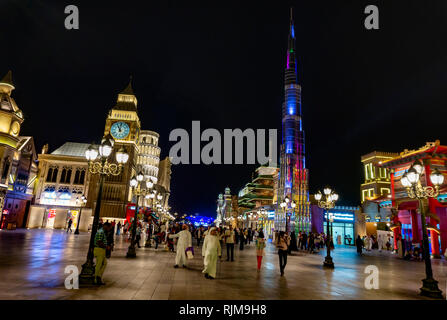 Dubai,UAE / 11. 06. 2018 : Colorful illuminated Global Village with crowd Stock Photo