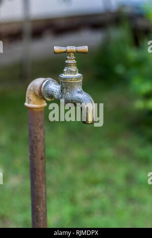 Outdoor water faucet, vintage, retro Stock Photo