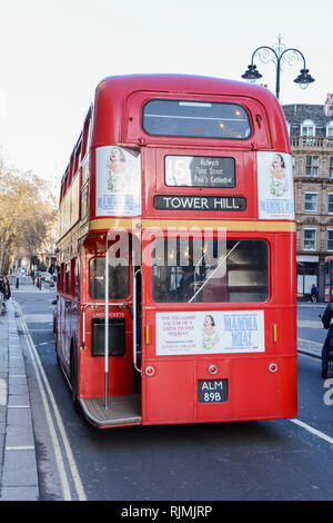An iconic red 'Routemaster' London double-decker bus on Heritage Route 15 on the Strand in London's West End. Stock Photo