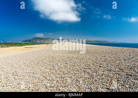 View along Chesil Beach near Weymouth towards the Isle of Portland Dorset England UK Stock Photo