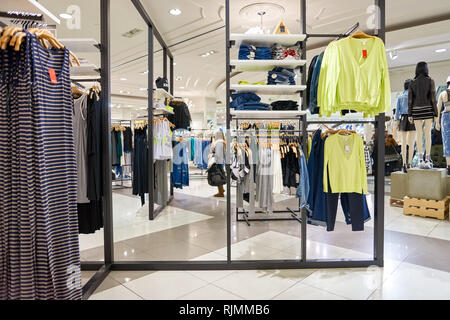 NEW YORK - MARCH 19, 2016: inside of Forever 21 in New-York. Forever 21 is an American chain of fast fashion retailers with its headquarters in Los An Stock Photo