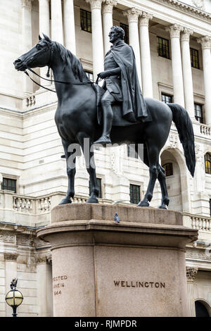 United Kingdom Great Britain England City of London financial centre center equestrian statue of Duke of Wellington monument Bank of England fac Stock Photo