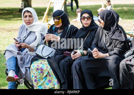 London, England, UK. Muslim women in Oxford Circus wearing a hijab