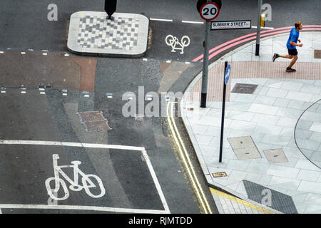 London England United Kingdom Great Britain Southwark Bankside Sumner Street shared bicycle lane pavement painted sign road marking crossing Stock Photo