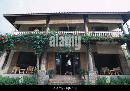 Caption: Luang Prabang, Laos - Sep 2003. The Sala Prabang Hotel in Luang Prabang - a colonial mansion, Sala Prabang has recently been restored and con Stock Photo