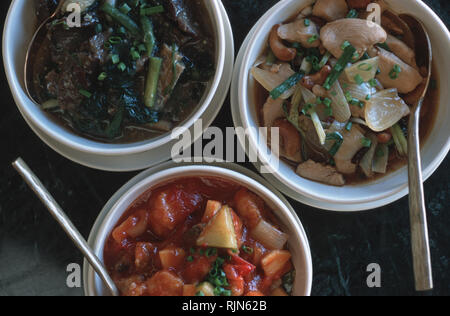 Caption: Luang Prabang, Laos - Sep 2003. Lao cuisine served at the Pansea Phou Vao hotel in Luang Prabang. A neo colonial building, the Phou Vao was p Stock Photo