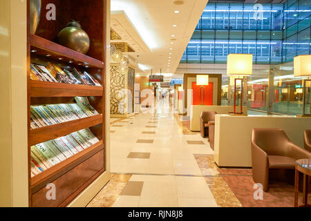 DUBAI, UAE - CIRCA APRIL, 2016: interior of Emirates business class lounge. Emirates is the largest airline in the Middle East. It is an airline based Stock Photo