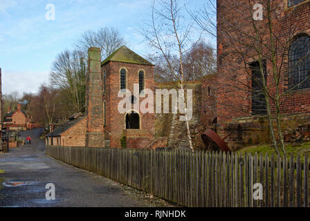 Victorian era blast furnaces, the centre one looking like a startled face, at Blists Hill Victorian Town, Shropshire, England, UK Stock Photo