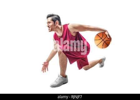 Handsome asian man playing basketball isolated over white background Stock Photo