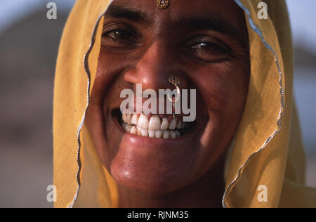 Caption: Khimsar, Rajasthan, India - Apr 2003. A Rajasthani tribal woman in a small village outside of Khmisar, a fort on the edge of the Thar Desert. Stock Photo