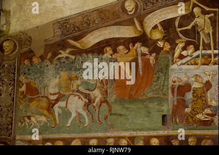Italy, Lombardy, Clusone. on the front of the Oratory of the governing fresco 'The Triumph of Death' and 'Dance of Death. Frescoe painted of Giacomo B Stock Photo