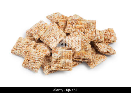 Studio shot of miniature bite size shredded wheat isolated against a white background - John Gollop Stock Photo