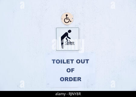 Baby change accessible disabled toilet out of order sign Stock Photo