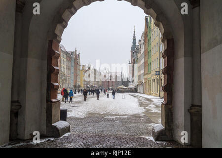 Ratusz, Main Town Hall, Renaissance style, 1556, seen through an arch in the Green Gate, in snowy weather, Długi Targ, Long Market, Gdańsk, Poland Stock Photo