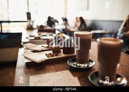 Dessert orders ready for serving on a cafe counter  Stock Photo