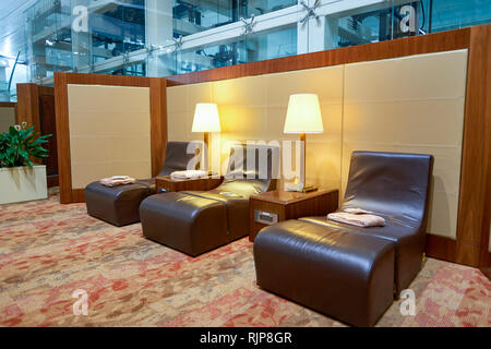 DUBAI, UAE - CIRCA APRIL, 2016: interior of Emirates business class lounge. Emirates is the largest airline in the Middle East. It is an airline based Stock Photo