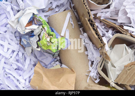 Detail of garbage with cardboard, shredded paper and paper Stock Photo