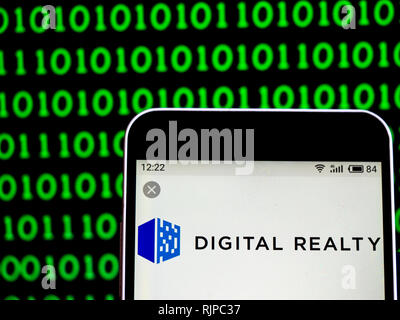 Digital Realty Real estate investment trust company  logo seen displayed on smart phone Stock Photo