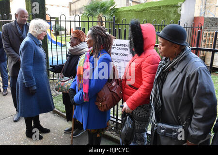 The Duchess of Cornwall meets the people who grow garden produce during a visit to the Lambeth GP Food Co-op Garden at Swann Mews, in Stockwell, London. Stock Photo