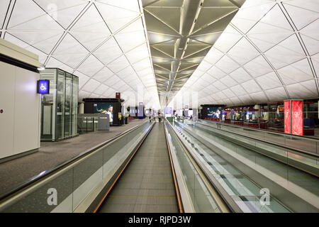 HONG KONG - NOVEMBER 16, 2015: interior of Hong Kong International Airport. It is the main airport in Hong Kong. The airport is located on the island  Stock Photo