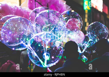 Blurred surface bubbles. Christmas bokeh background. Color defocused lights. circular bokeh sparkle glitter lights background. Happy New Year concept Stock Photo