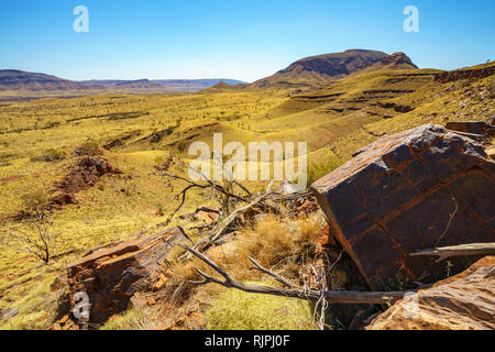 hiking on mount bruce in the desert of karijini national park, western australia Stock Photo