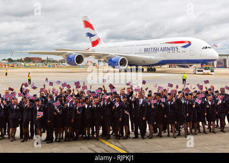 BA staff greet the airline's first Airbus A380 at Heathrow Airport after it flies in from the factory in July 2013.