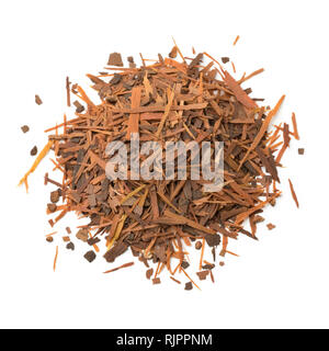 Heap of Lapacho tea or Taheeboo isolated on white background Stock Photo