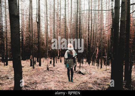 Woman standing in forest in winter, Ural, Sverdlovsk, Russia Stock Photo