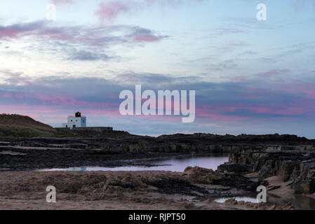 Bamburgh Castle & beach Stock Photo